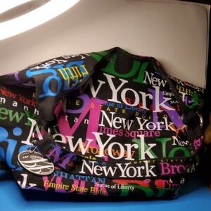 Large ,colorful Jay Joshua Coated Nylon Duffle Bag.